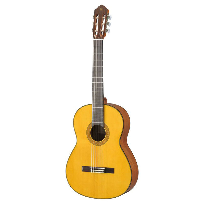 Yamaha CG142S classical guitar in gloss natural, front view showing the solid spruce top, decorative rosette, rosewood fingerboard and bridge, and slotted headstock with chrome tuners