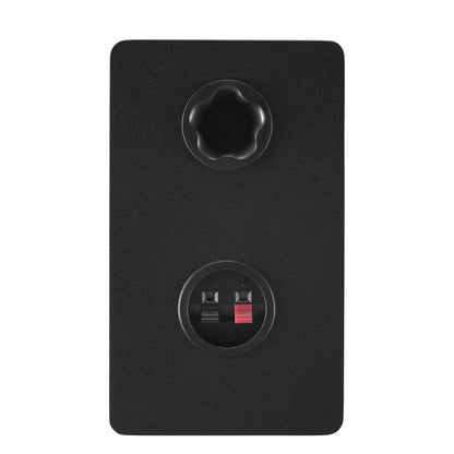 Rear panel of the black Yamaha HS3 right speaker, showing the bass-reflex port and the terminals that connect it to the powered left speaker