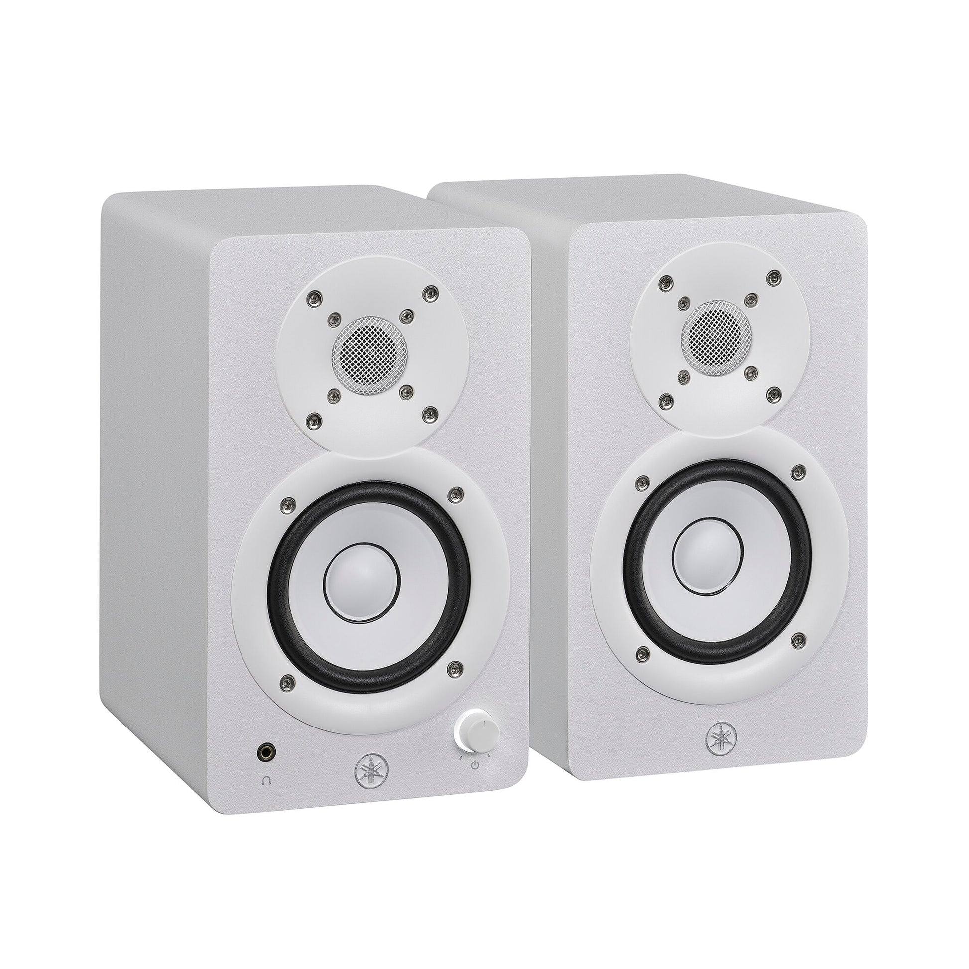 Yamaha HS3 powered studio monitors in white, angled pair view, with the left speaker's front volume knob and headphone jack