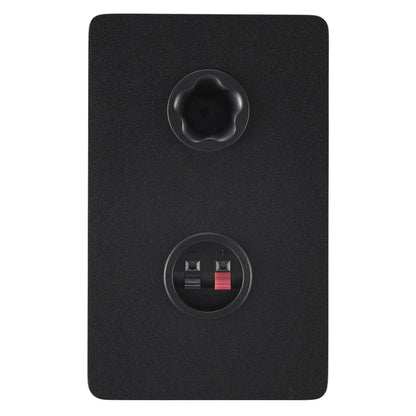 Rear panel of the black Yamaha HS4 right speaker, showing the bass-reflex port and the terminals that connect it to the powered left speaker