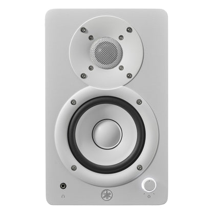Front view of the white Yamaha HS4 left speaker, showing the woofer, dome tweeter, headphone jack and volume knob