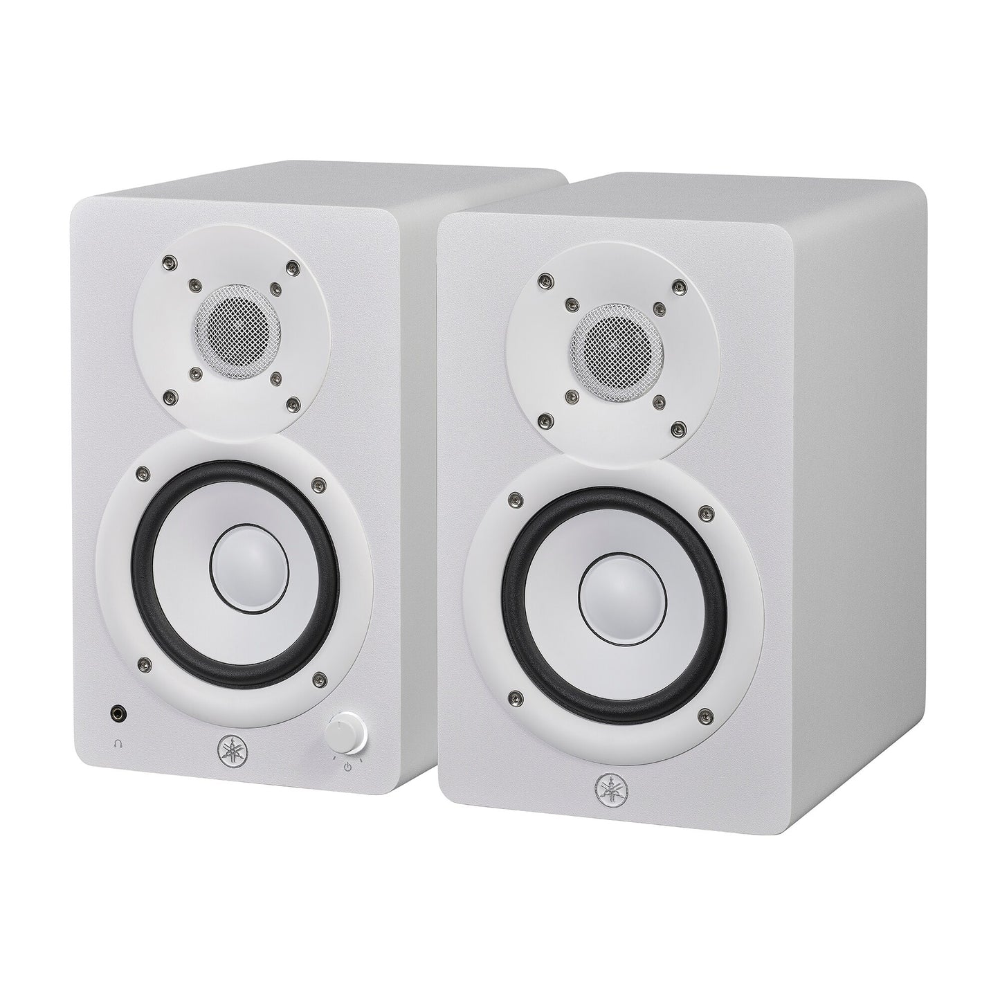 Yamaha HS4 powered studio monitors in white, angled pair view showing the left speaker's front volume knob and headphone jack