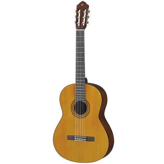 Yamaha C40 full-size nylon-string classical guitar in gloss natural, front view showing the spruce top, decorative rosette, rosewood bridge and slotted headstock with chrome tuners