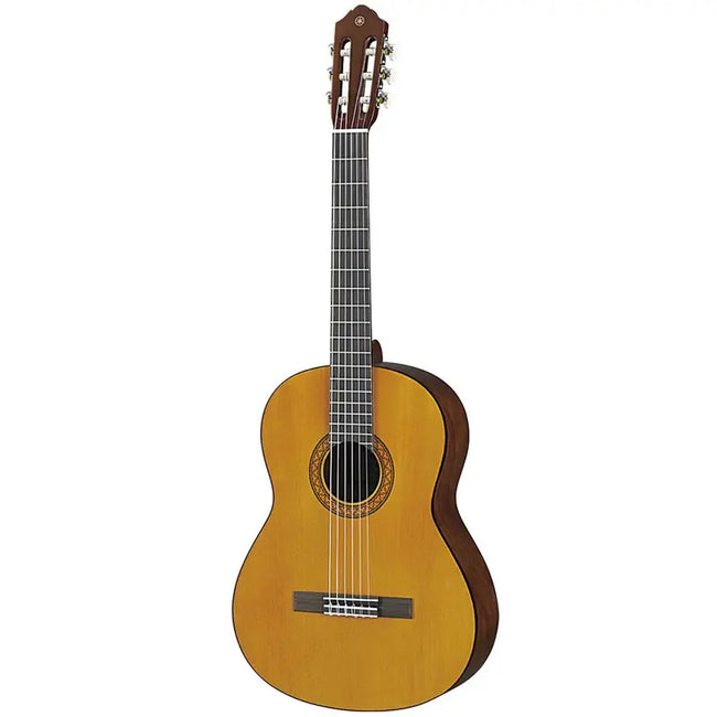 Yamaha C40 full-size nylon-string classical guitar in gloss natural, front view showing the spruce top, decorative rosette, rosewood bridge and slotted headstock with chrome tuners