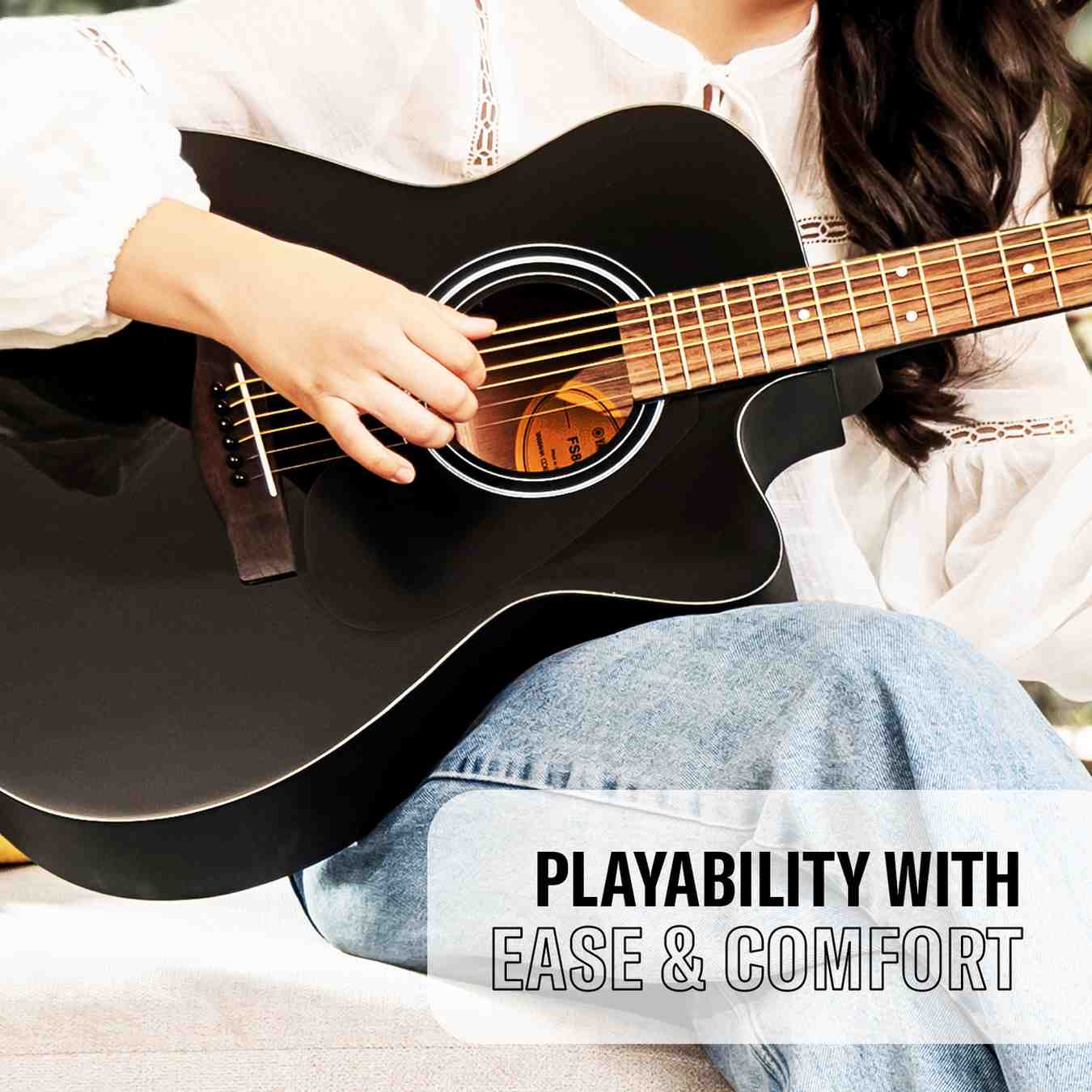 Yamaha FS80C concert cutaway acoustic guitar being played
