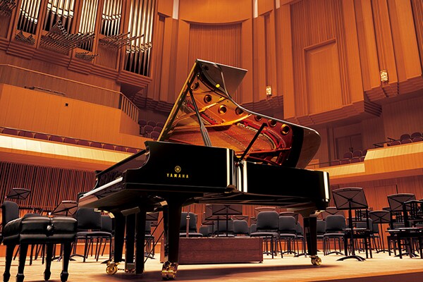 Yamaha CFX concert grand piano on stage