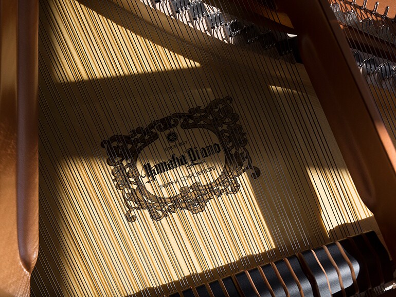 Inside a Yamaha concert grand piano