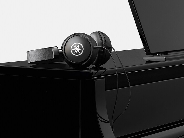 Yamaha headphones on a Clavinova digital piano