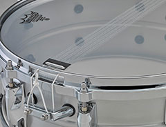 SG-type 10-strand snare wire fitted to a Yamaha Recording Custom metal snare drum