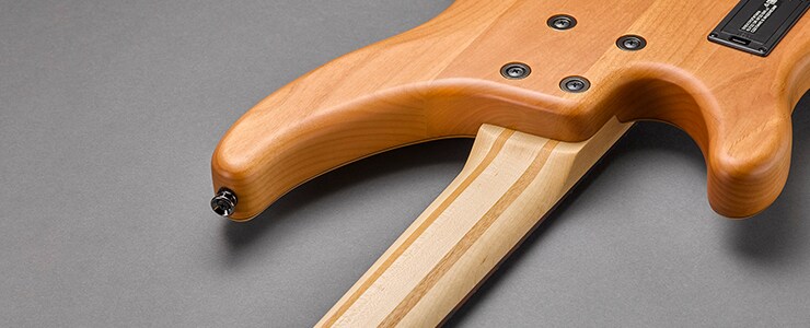 Precision-fitted bolt-on neck joint on the Yamaha TRBX604FM